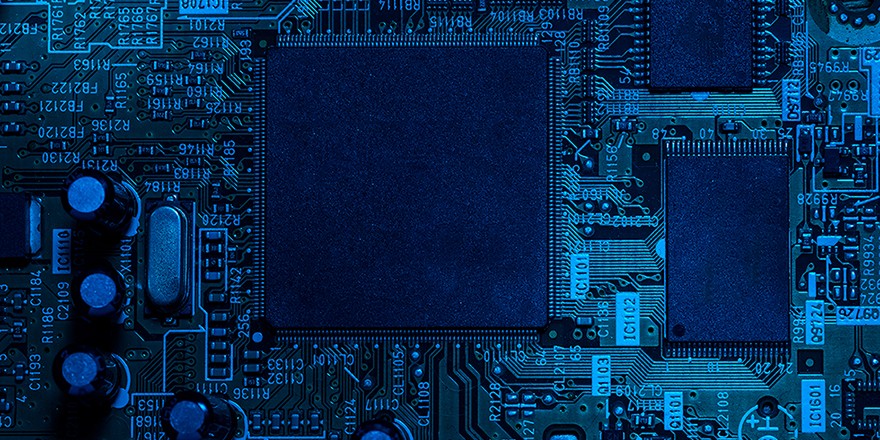 Inside of the digital electronic computer of processor chip on computer mainboard.