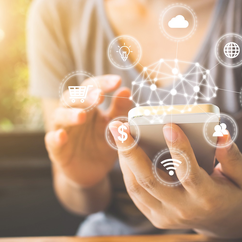 female hand using smartphone with icon technology artificial intelligence (AI) and internet of things (IOT)