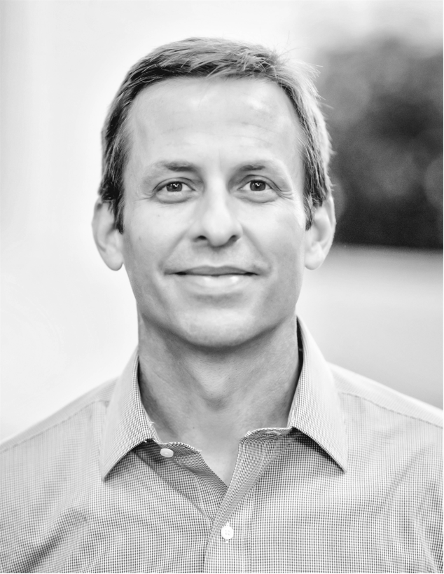 greyscale photo of Michael Dickey