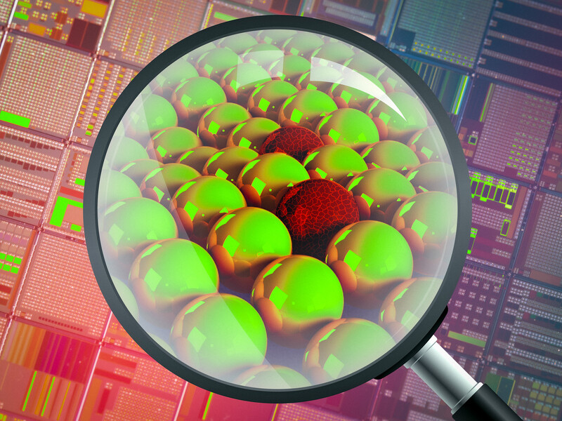 A magnifying glass seeing into a semiconductor and finding atoms, which look like smooth spheres but some are cracked and brittle.