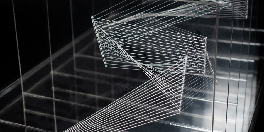 A layered sculpture resembling zig-zag patterns and geometric shapes